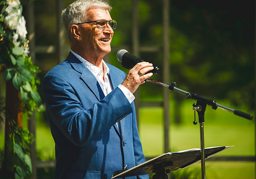 Jeff F. Sager speaking at an outdoor ceremony