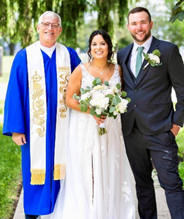 Jeff Sager with a newly married couple